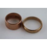 A 9ct rose gold plain wedding band, band width approximately 9.5mm, ring size N½ together with a