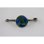 An Art Nouveau enamelled silver brooch in the style of Archibald Knox, the celtic style blue and