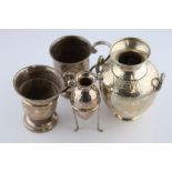 A Victorian silver footed mug, engraved scrolls and swags, blank cartouche, scroll S shaped