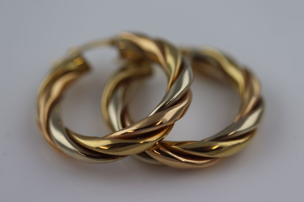 A pair of unmarked gold twisted hoop earrings, subtle tri-colour gold finish, diameter - Image 7 of 7