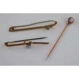 An Edwardian pink garnet and seed pearl 9ct yellow gold bar brooch, the small round mixed cut pink