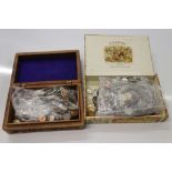 World coinage in a wooden box and cigar box