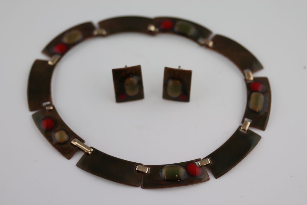Kay Denning (American, mid 20th century), an enamelled collar necklace, olive green enamel on copper