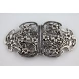 An Art Nouveau silver nurses' belt buckle, London 1901 Joseph Henry Raymond, openwork design,