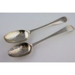 A George I silver Hanoverian pattern table spoon with rat tail bowl, initials to reverse of