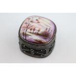 A handpainted white metal trinket pot and cover, the porcelain handpainted Scandinavian lake scene