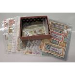 World banknotes in sleeves and a box