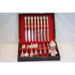 A canteen of silver plated cutlery for eight place settings, floral and scroll decoration