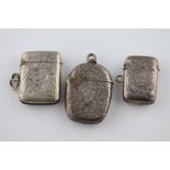 A Victorian small silver vesta case, initialled cartouche, leaf engraving to front and reverse,