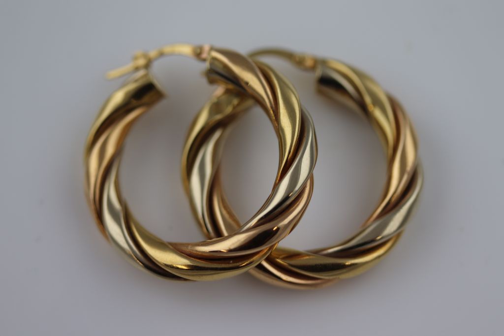 A pair of unmarked gold twisted hoop earrings, subtle tri-colour gold finish, diameter - Image 6 of 7