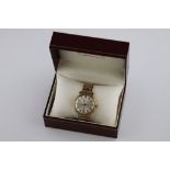 A cased Gents Rotary Automatic 21 jewels wristwatch, circular champagne dial, gilt Roman numerals