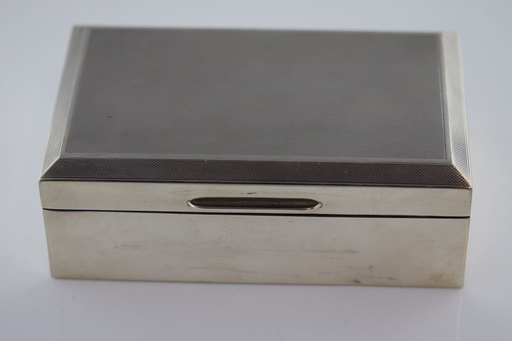 A mid 20th century silver cigarette box, Birmingham 1960, makers mark indistinct, engine turned - Image 2 of 4