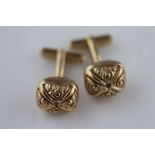 A pair of Gents 9ct yellow gold cushion shaped cufflinks, engraved scroll detail, size of head