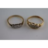 An early 20th century diamond 18ct yellow gold platinum set ring, three illusion set old cut