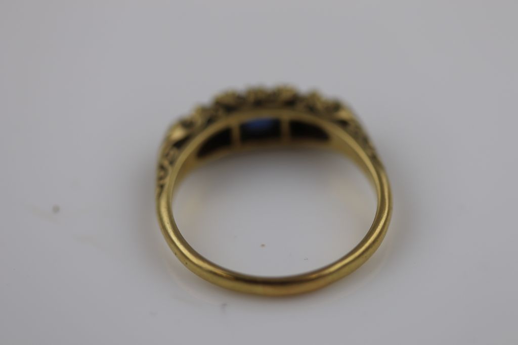 A Victorian style blue sapphire and diamond 18ct yellow gold three stone boat head ring, the central - Image 6 of 6
