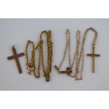A 9ct yellow gold crucifix pendant necklace, plain crucifix with incised border, approximately