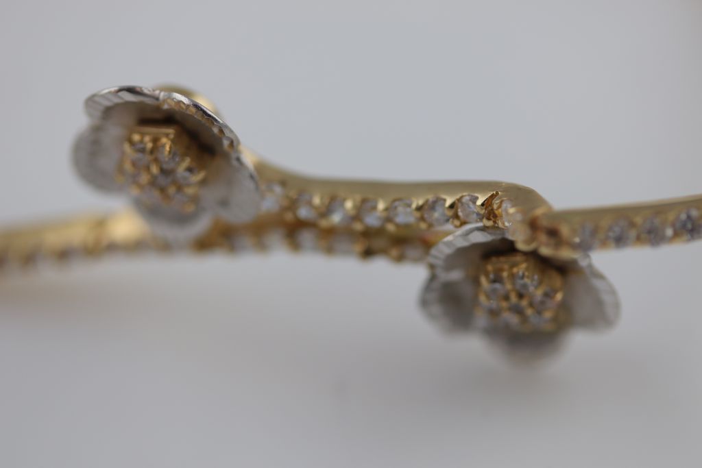 A white stone 14ct yellow and white gold bracelet, floral design, tongue and box snap clasp, - Image 2 of 5