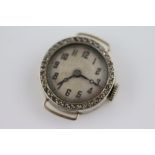 A circa 1930s ladies diamond 18ct white gold cocktail watch, the round silvered dial with black