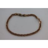 A 9ct rose gold fancy link bracelet, length approximately 18cm, lobster clasp