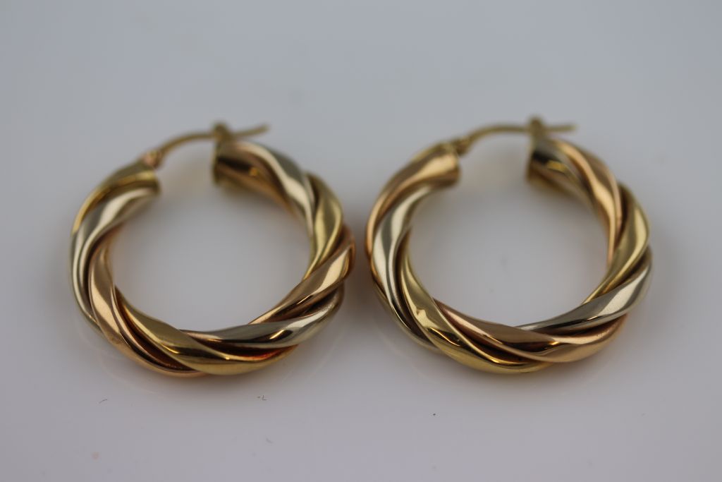 A pair of unmarked gold twisted hoop earrings, subtle tri-colour gold finish, diameter - Image 2 of 7