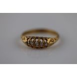 A Victorian diamond five stone boat head 18ct yellow gold boat head ring, five small graduated