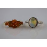 An opal silver gilt dress ring, the oval cabochon cut precious white opal measuring approximately