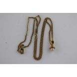 A pearl pendant necklace in the form of an acorn on yellow gold curb link chain stamped 18K, rope