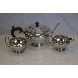 A George VI three piece silver tea service, Birmingham 1946, A Wilcox, the melon shape plain form