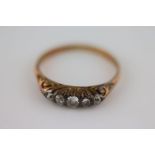 A Victorian diamond graduated five stone diamond ring, small old cut and eight cut diamonds total