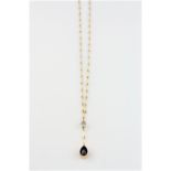 A diamond and blue sapphire 18ct yellow gold pendant necklace