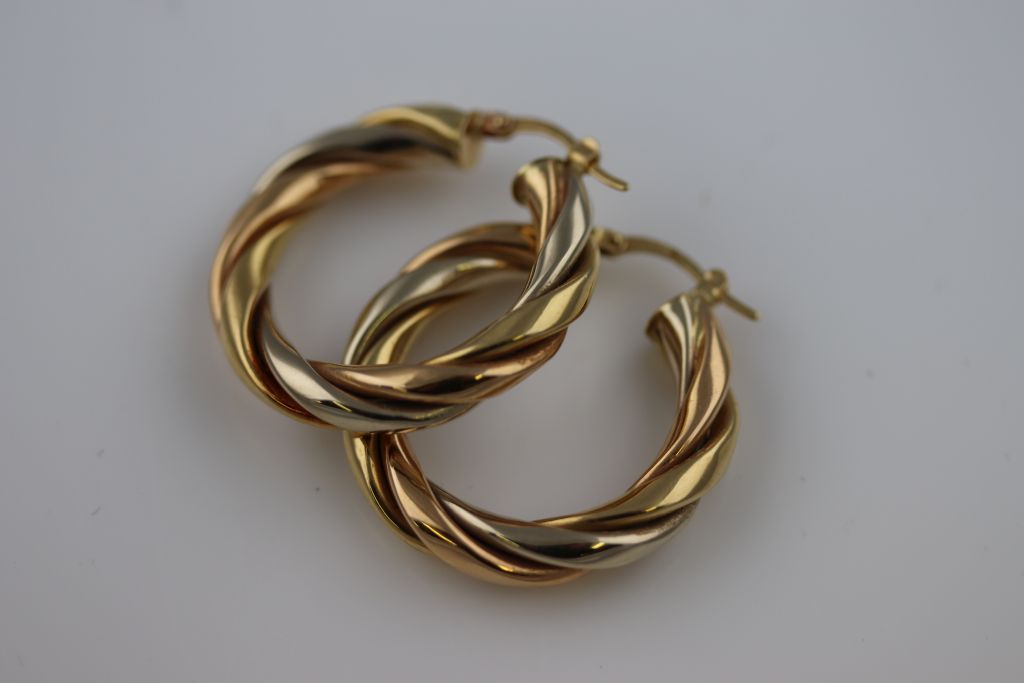 A pair of unmarked gold twisted hoop earrings, subtle tri-colour gold finish, diameter - Image 3 of 7