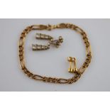 A 9ct yellow gold figaro link bracelet length approximately 17.5cm together with a pair of white set