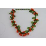 A vintage Murano glass bead clementine necklace, circa 1950s clusters of frosted oranges and leaves,