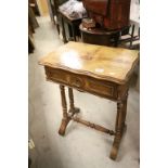 19th century Walnut Veneered Work / Sewing Table with hinged lid on double turned reeded supports