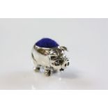 Silver pig pincushion