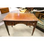19th century Mahogany and Cross-banded Writing Desk with Three Drawers and shaped apron, raised on