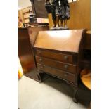 Mid 20th century Mahogany and Quarter Veneered Bureau raised on cabriole legs with paw feet