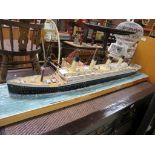 Model of Titantic Ocean Liner on a wooden framed base and Sunday Mirror Collectors Newspaper