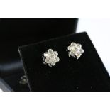 Pair of 18ct white gold Diamond daisy style earrings