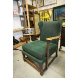 1930's / 40's Oak Framed Wingback Elbow Chair together with a Nest of Two Oak Tables