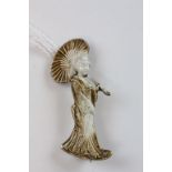 A white metal enamel brooch in the form of a Geisha girl