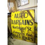 An enamel sign 'AUTO BARGAINS' of local interest