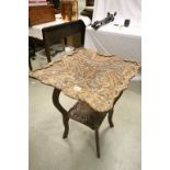 Well carved side table with floral / foliage design
