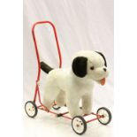 Child's vintage push along stuffed Dog toy with wheels and metal frame