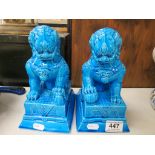 Pair of Oriental Blue Glazed Dogs of Foes on Plinths