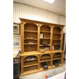 Large Pine Bookcase / Display Unit, the upper part with three sections of Shelves above a lower part