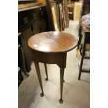 Small Georgian Mahogany Demi Lune Folding Table with back gate-leg, deep plain frieze raised on