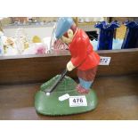 Cast iron doorstop in the form of a golfer