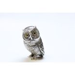 Cast Silver figure of an owl with glass eyes