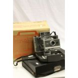 Polaroid cased cine camera and a Eumig 501 projector